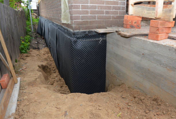 Happy homeowners after waterproofing job in Leopolis